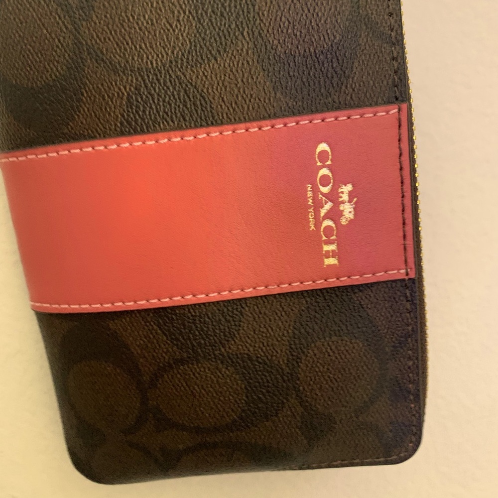 Coach wristlet! Received as gift, never carried.
